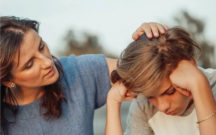 ouder in gesprek met kind - twijfel hoogbegaafdheid